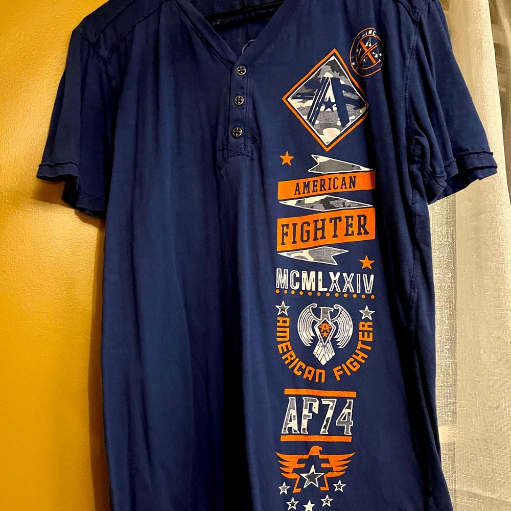 American‎ Fighter size medium blue shirt